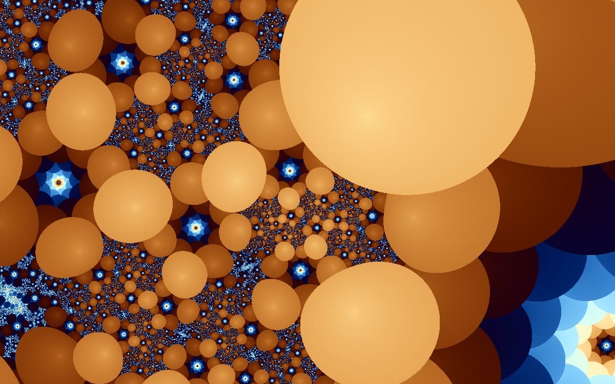 Copper-orange spheres of many sizes clustered over a deep blue field scattered with small blue-and-white star-shaped rosettes
